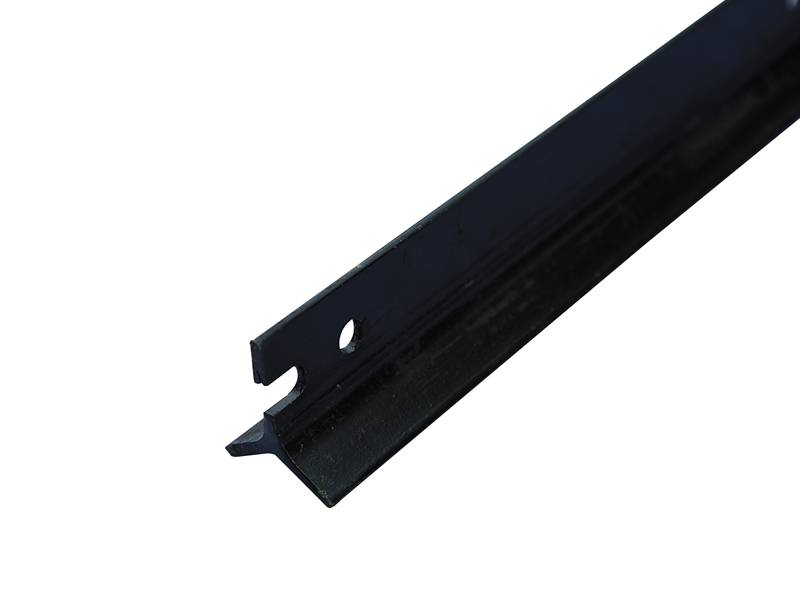 A black tar dipped star picket on white background.